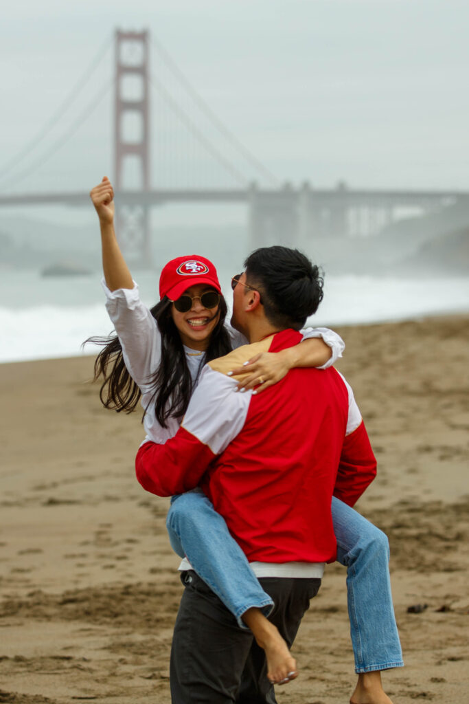 49ers engagement photo session at Baker Beach in San Francisco, California