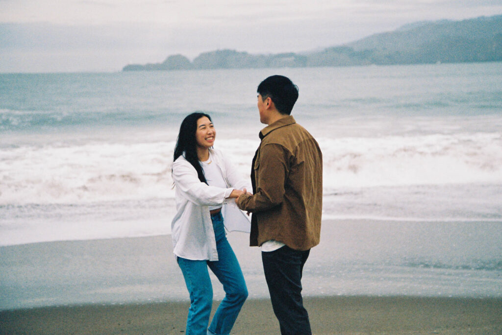 Engagement film photo session at Baker Beach in San Francisco, California. 