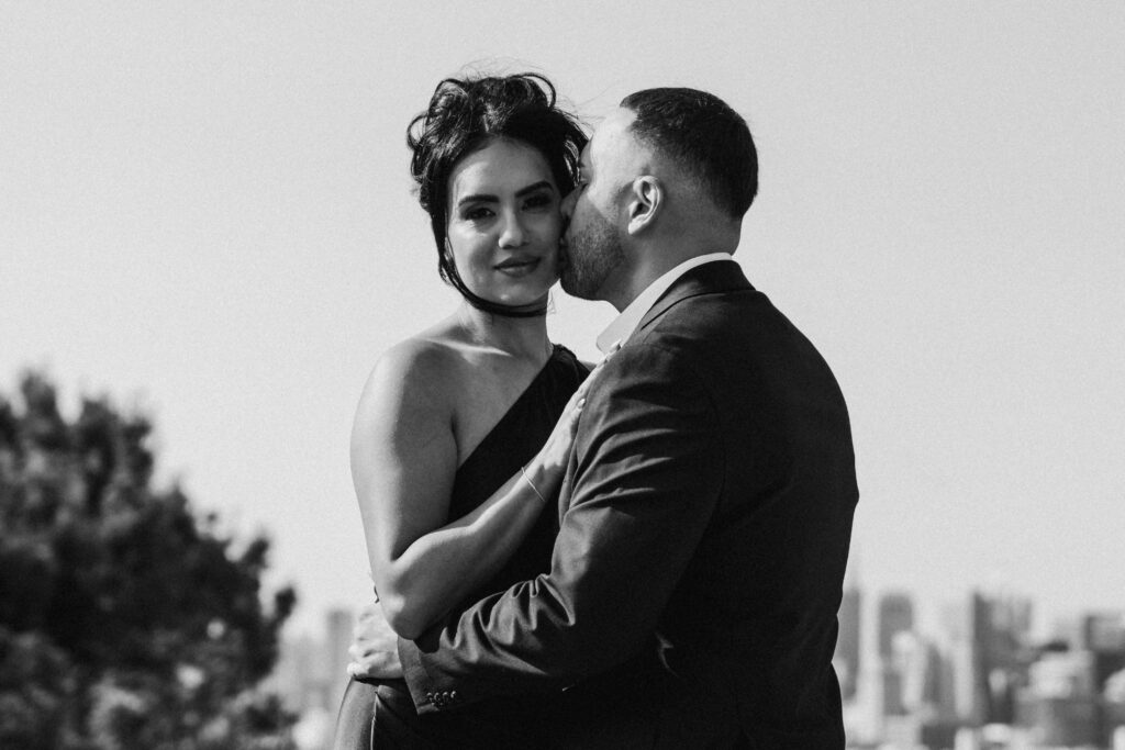 Engaged couple shares a kiss during their San Francisco engagement photos.